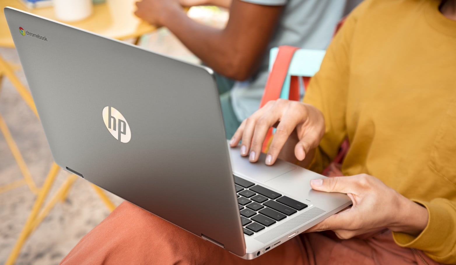 Woman using HP laptop