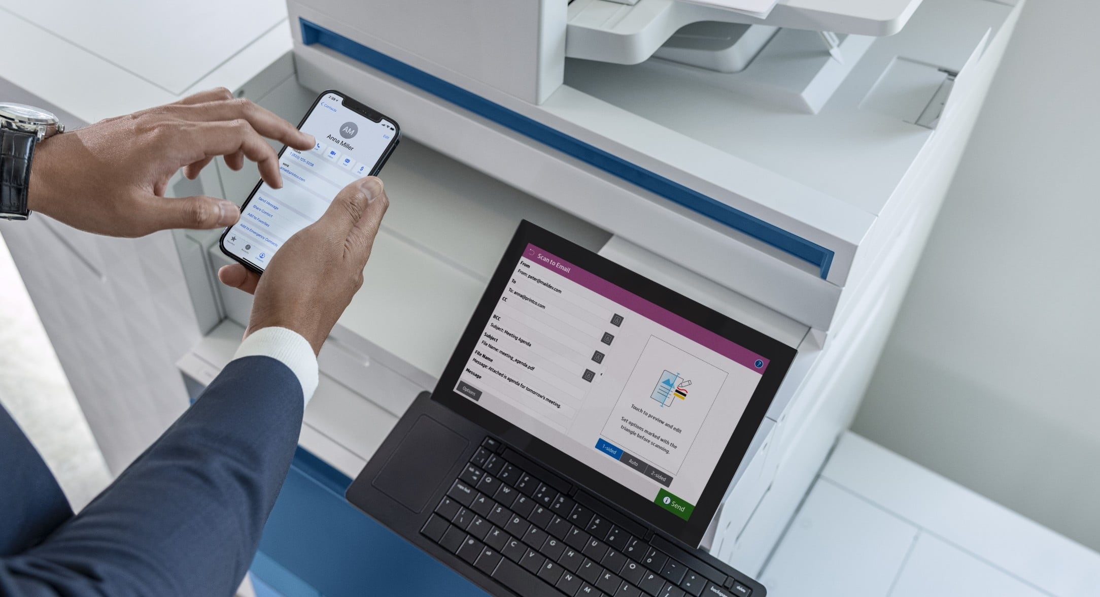 Hands of man in suit, holding a smartphone and tapping a print app, at HP LaserJet Managed printer