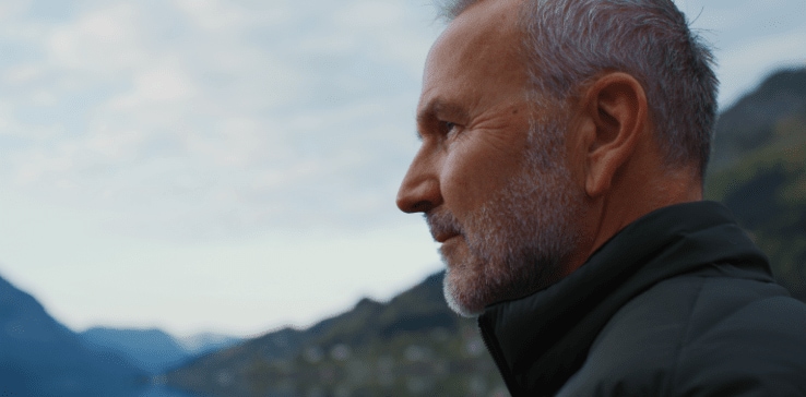 A person looking at the water