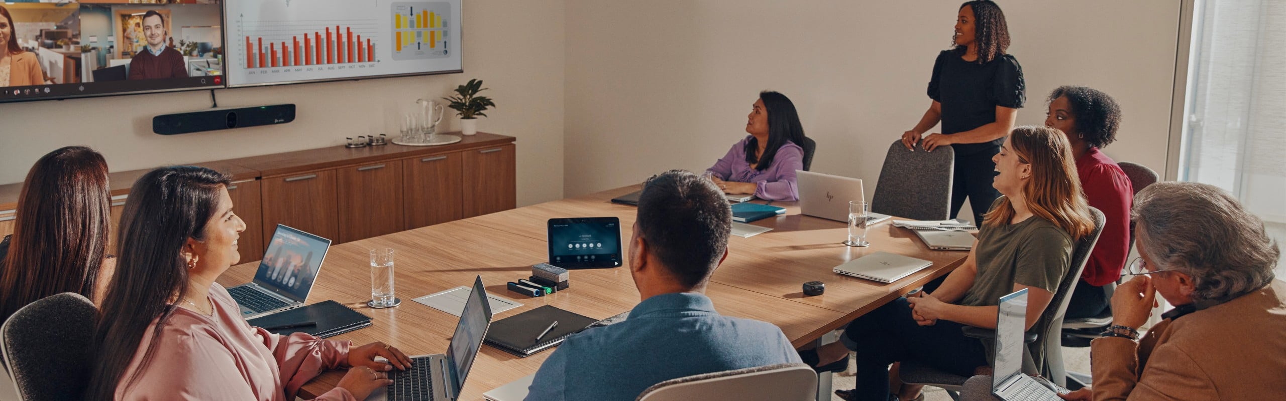 Group of people having a conference in a boardroom.