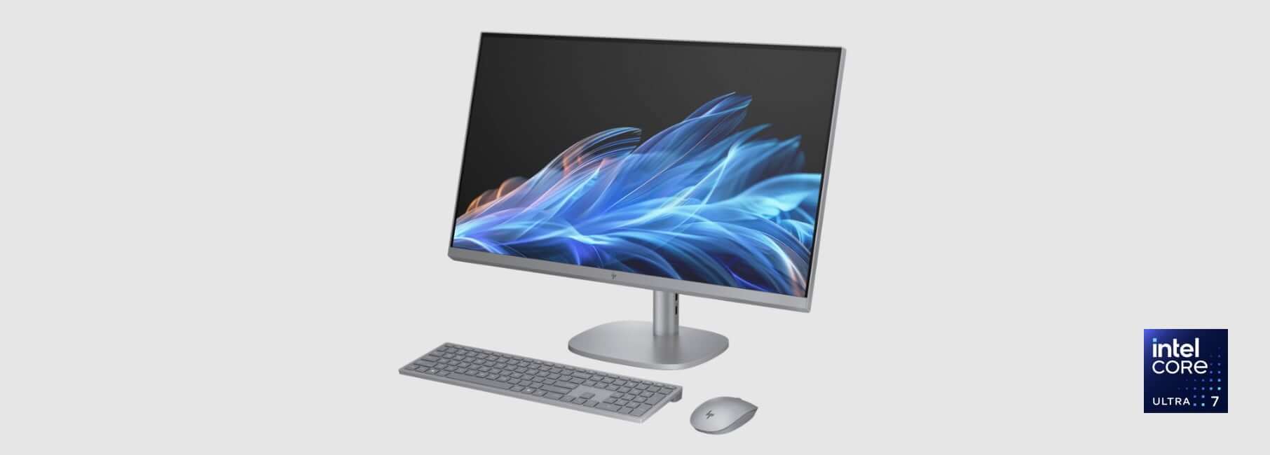 An HP OmniStudio X All-in-One AI PC with blue wireless mouse and keyboard