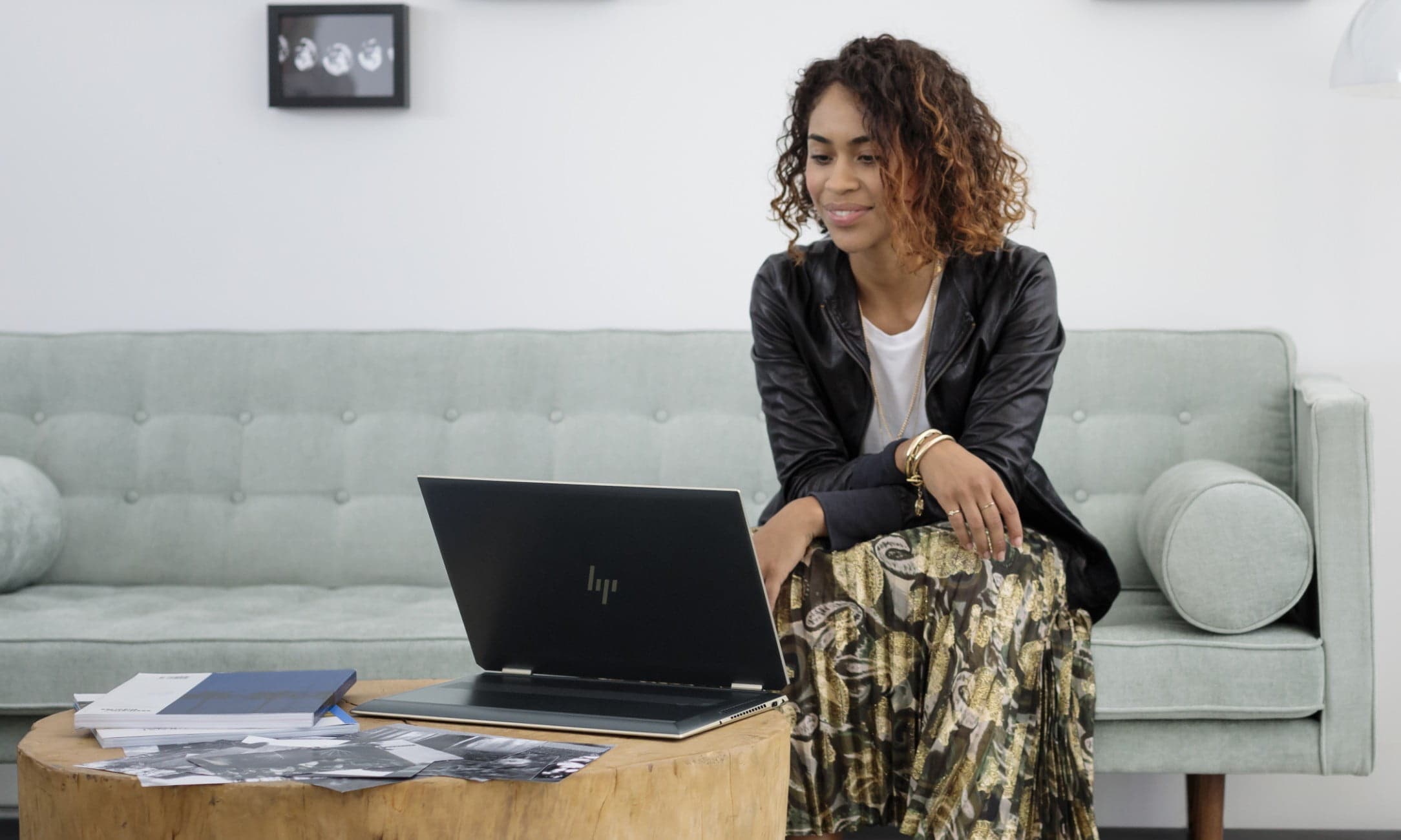 Woman working with her HP laptop.