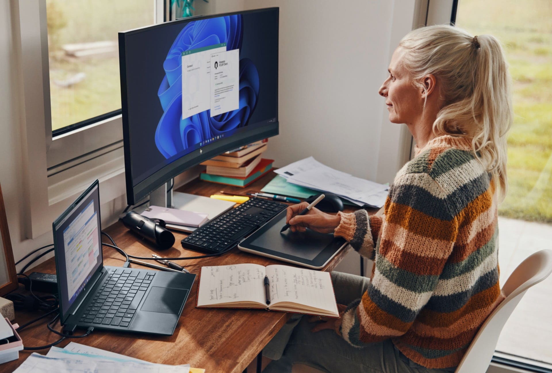 Woman working with tablet at desk