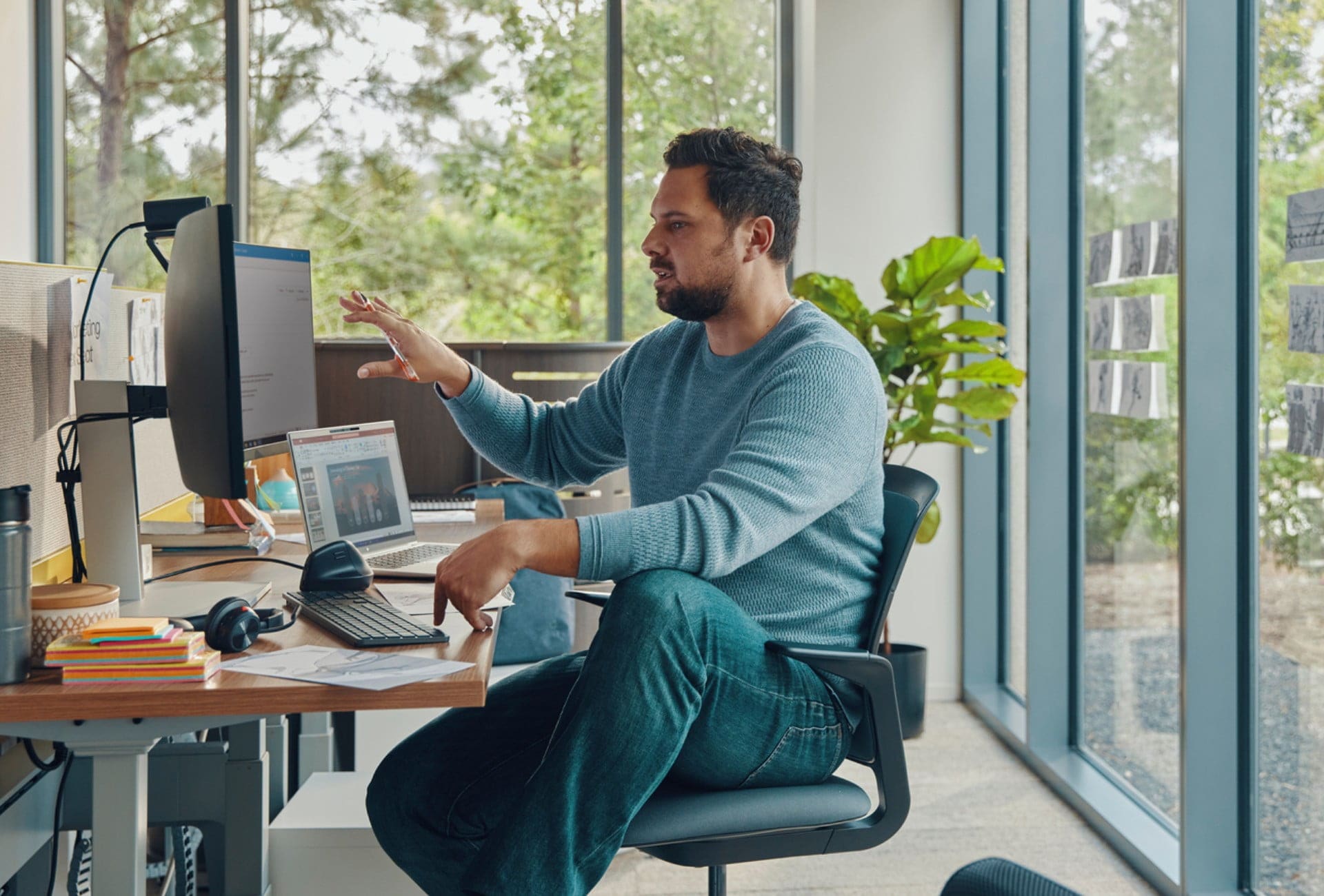 Man collaborating on desktop computer
