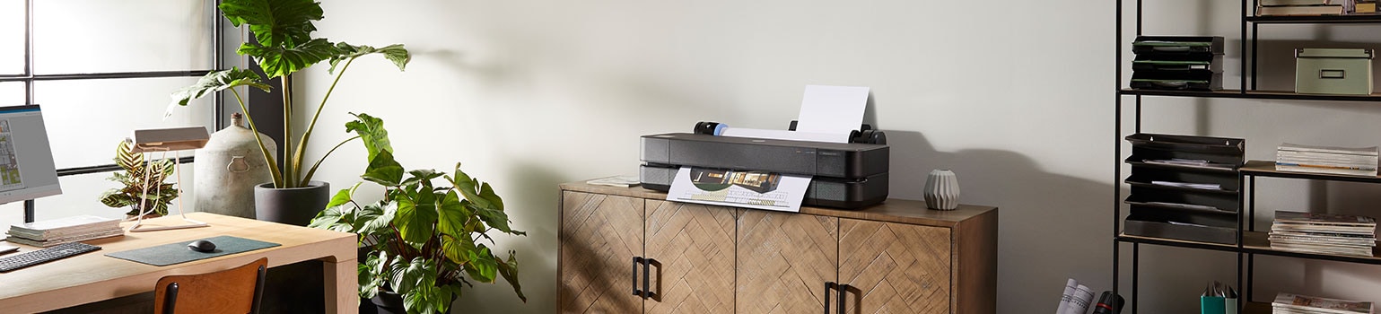 HP DesignJet T250 plotter in an office