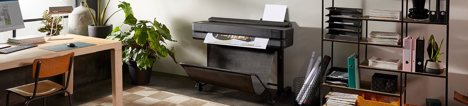 HP DesignJet T650 plotter next to a window