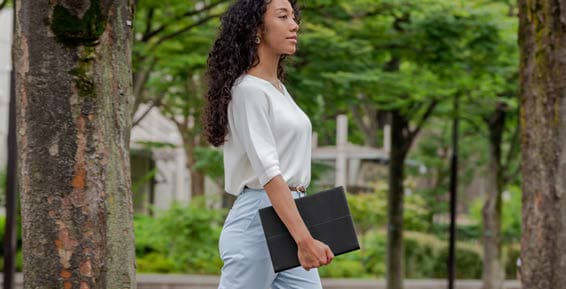 Woman walking in a park