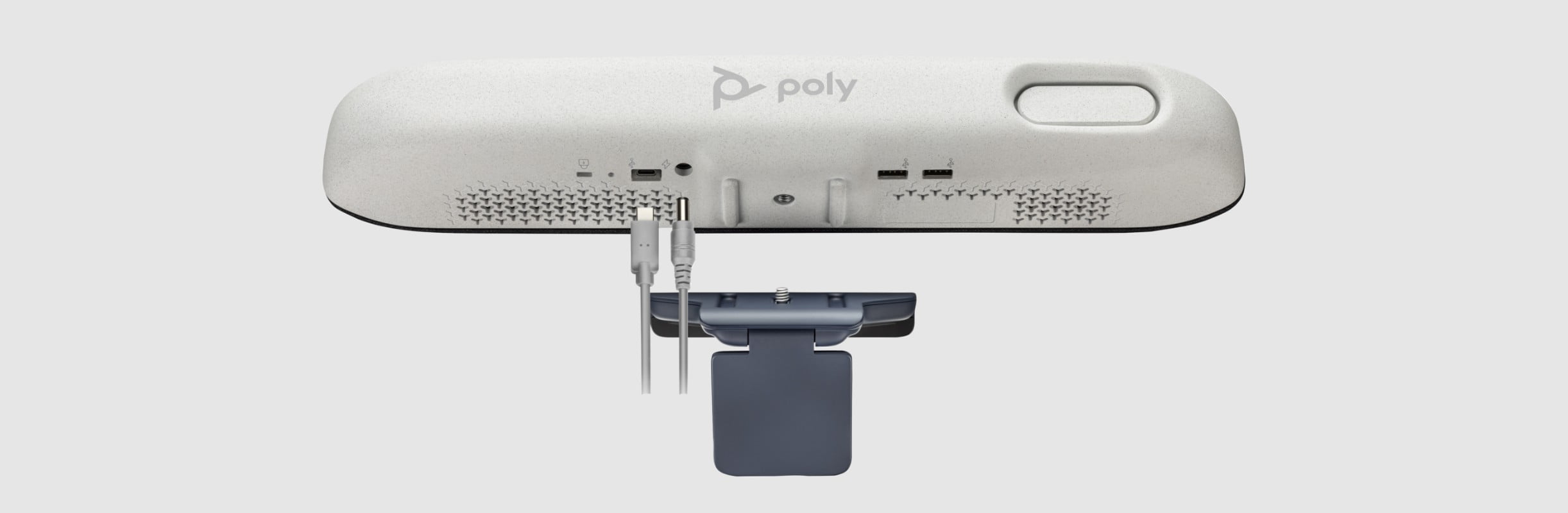 Poly monitor display mounting clamp showing how it connects to underside back of Poly Studio video bar​