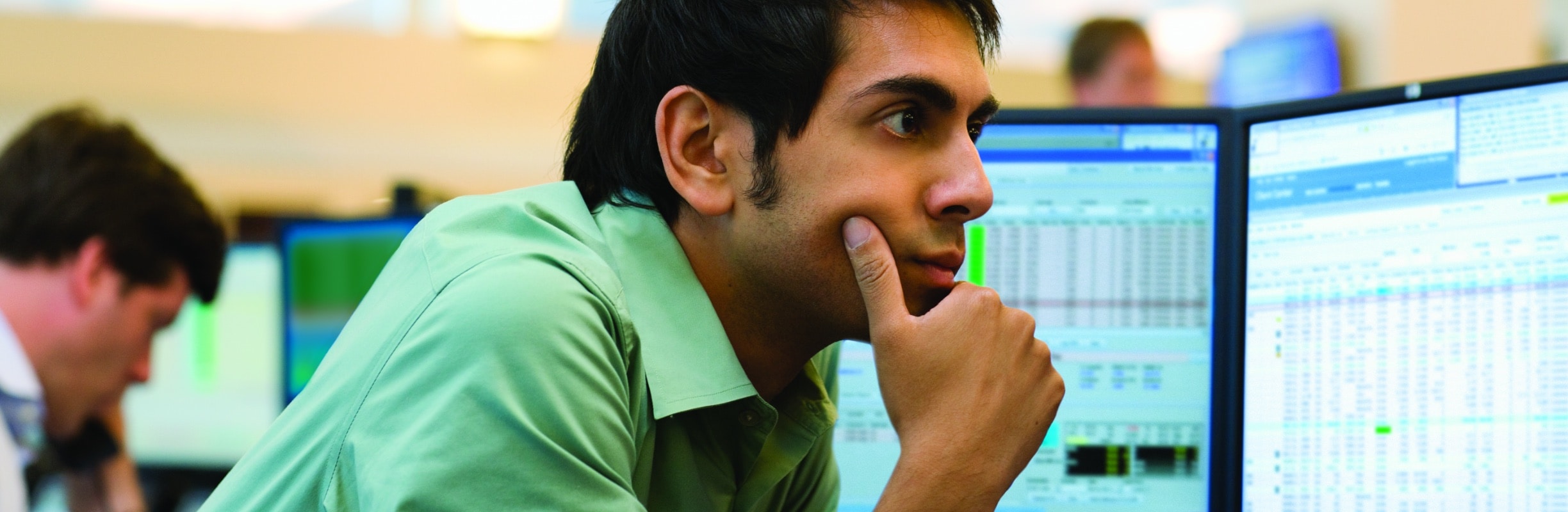 Man thinking at computer