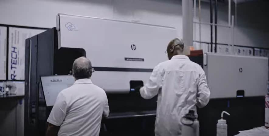 Men using an HP Indigo Digital Press