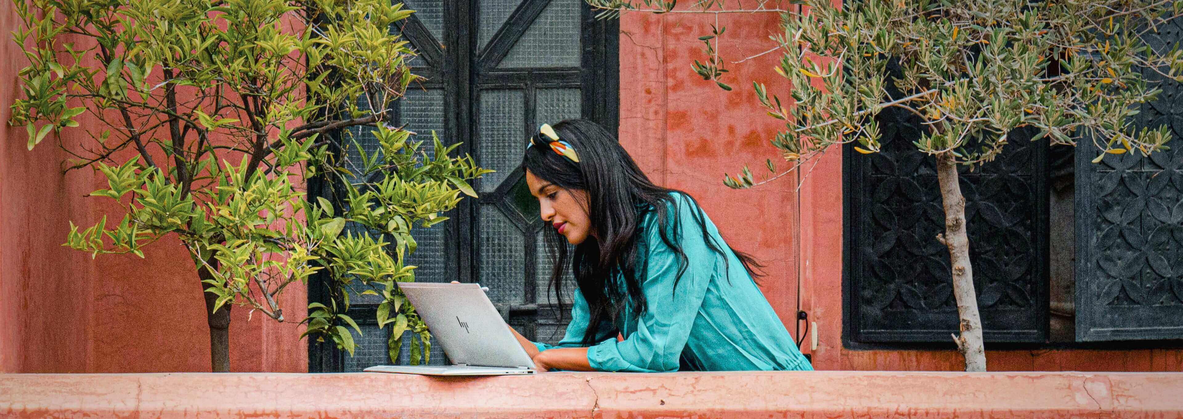 Lady working on Laptop