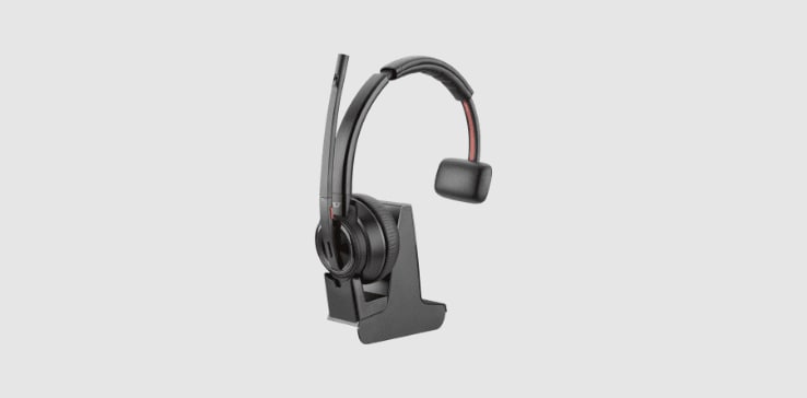 Poly Savi 8210 Office series DECT wireless headset on base stand with multi device connectivity and volume controls