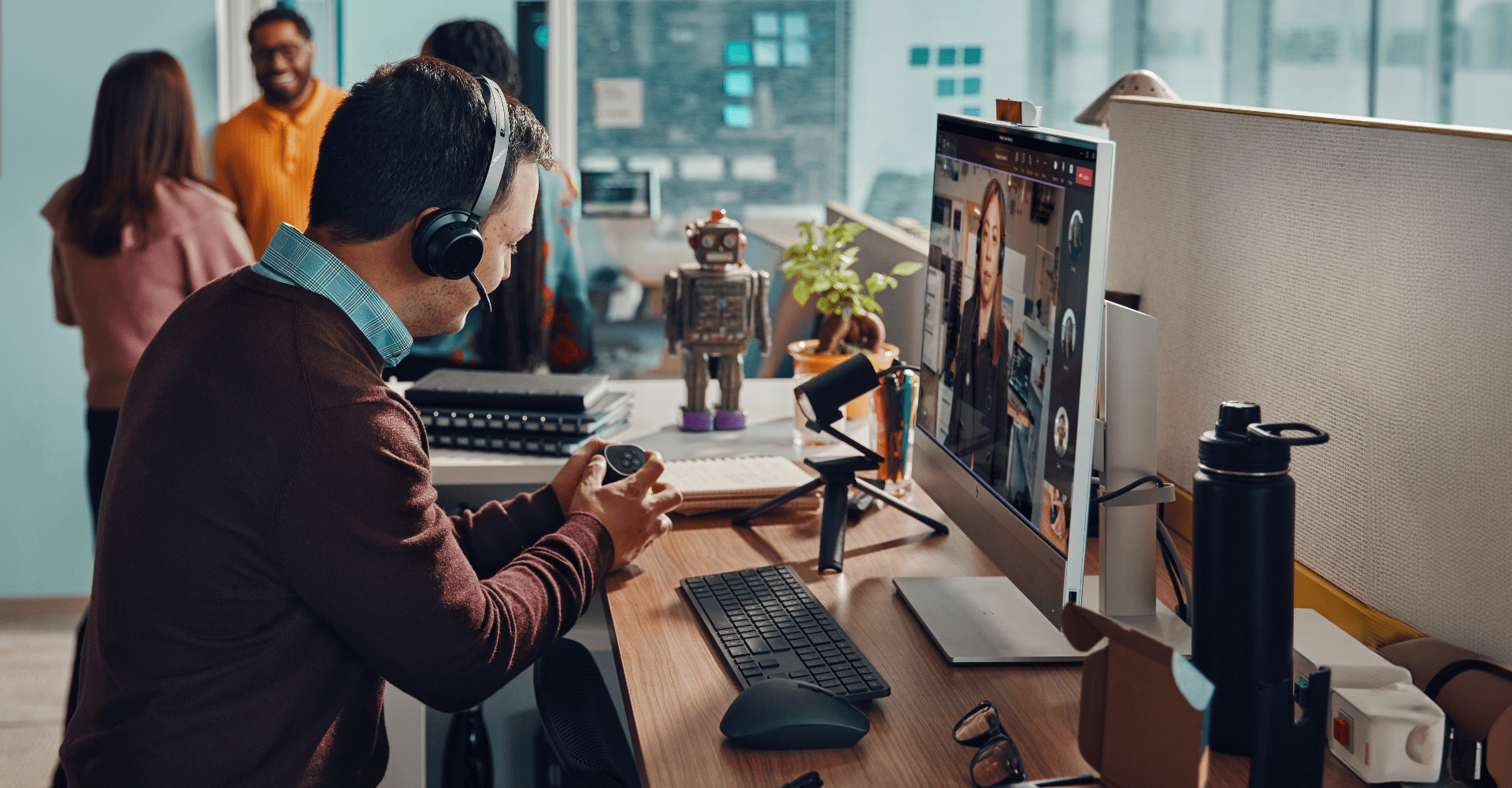 Man in the office on a video conferencing call on Microsoft Teams