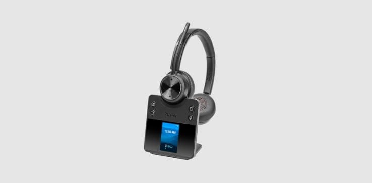 Poly Savi 7420 Office series DECT wireless headset shown on base stand with color display for multi device connectivity