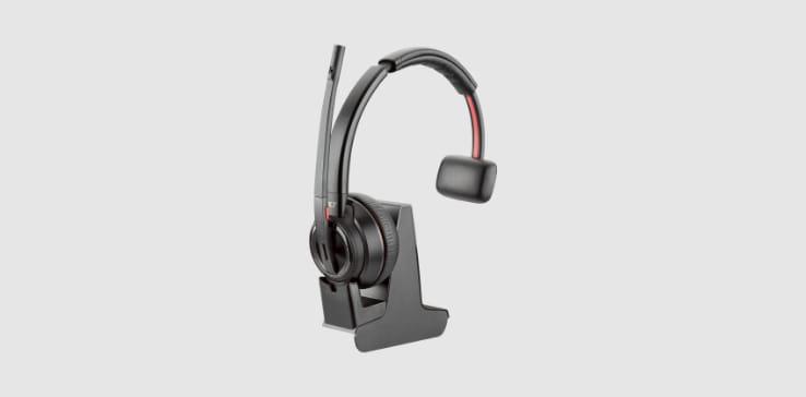 Poly Savi 8210 Office series DECT wireless headset on base stand with multi device connectivity and volume controls