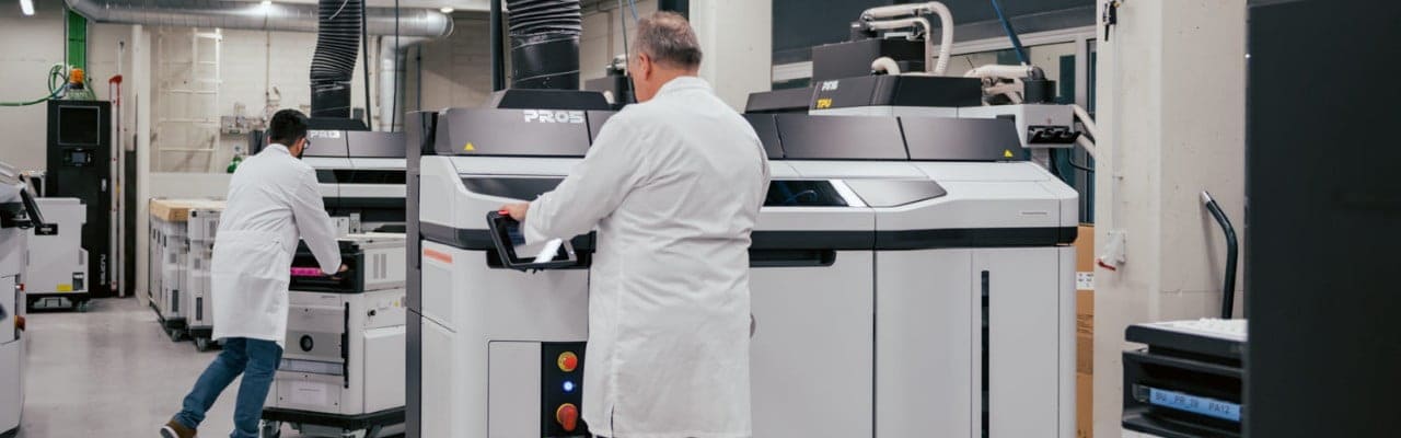 3D engineers working in maintenance of HP Jet Fusion industrial 3D printers 