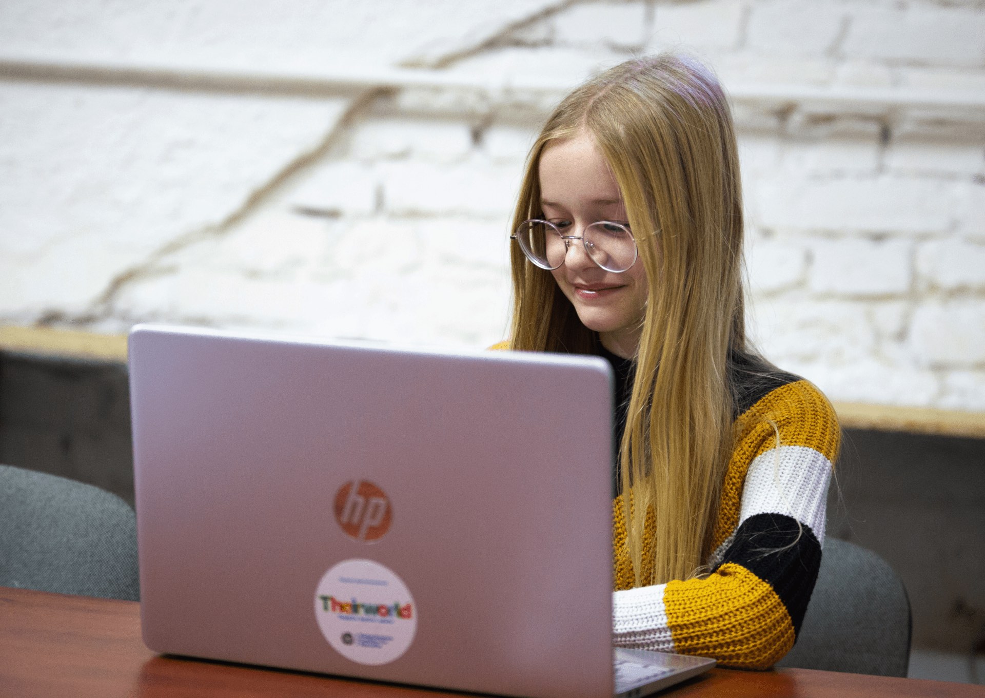 A girl using an HP Laptop